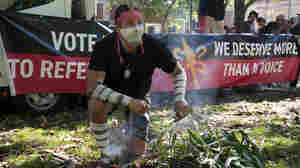 Thousands rally for 'Invasion Day' protests on Australia Day holiday