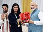 Commonwealth Games 2022: Nikhat Zareen gifts PM Narendra Modi boxing gloves, Hima Das gives traditional gamocha