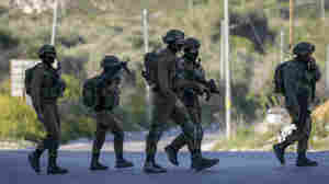 Israeli forces have killed three Palestinians in a shootout in the West Bank