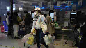 Beijing adds new COVID quarantine centers, sparking panic buying