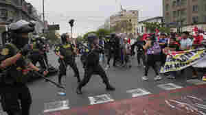 Protesters from Peru's Andes descend on the country's capital to demand leader resign