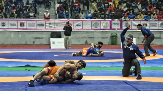 Wrestlers glad as competition resumes, eye Olympic berths