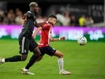 Pogba out of Barcelona friendly due to knee injury