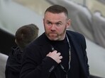 Wayne Rooney apologizes to family after photos surface