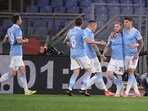 Lazio cruise past AC Milan to keep top four dream alive