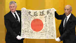 A WWII Japanese soldier's 'good luck flag' is returned to his family from U.S. museum