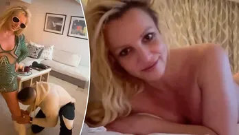 Britney Spears gets licked by mystery man, goes topless in new videos shared days after announcing divorce