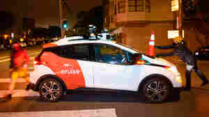 Armed with traffic cones, protesters are immobilizing driverless cars