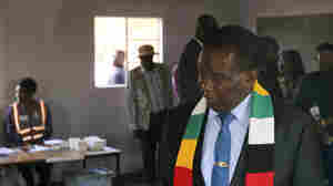 Zimbabwe's electoral commission says President Mnangagwa has won a second term