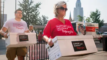 Opponents of NE's taxpayer-funded school voucher plan claim enough signatures to take issue to ballot box