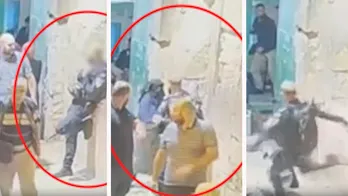 Palestinian woman kicked, knocked to ground after trying to stab Israeli police officer in Jerusalem