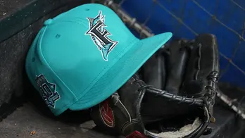 Marlins ball boy commits foul play in fair territory during game