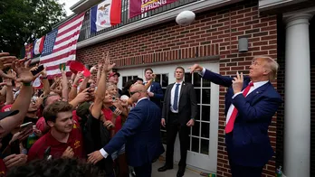 Donald Trump tailgates before Iowa-Iowa State game, crowd goes crazy as he walks into stadium