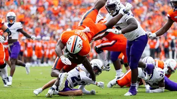 Virginia running back, shooting survivor Mike Hollins scores first touchdown since last year's tragedy