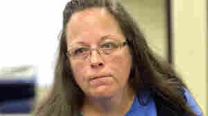 Kim Davis is ordered to pay $100,000 to same-sex couple she denied marriage license