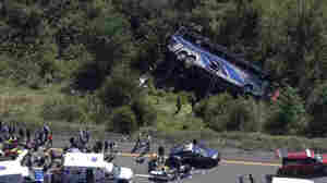 Bus carrying high school students to band camp crashes, killing 2 adults