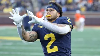 Michigan's Blake Corum talks Jim Harbaugh's return to sidelines, 'electric' atmosphere at Nebraska