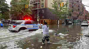 New York swamped by record-breaking rainfall as more downpours expected Saturday