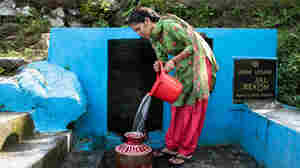 As the 'water tower of Asia' dries out, villagers learn to recharge their springs