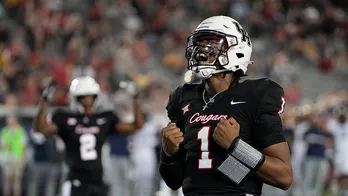 Houston pulls off stunning victory over West Virginia with last-second Hail Mary touchdown pass