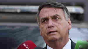 Lawmakers in Brazil say Bolsonaro should be charged with attempting to stage a coup