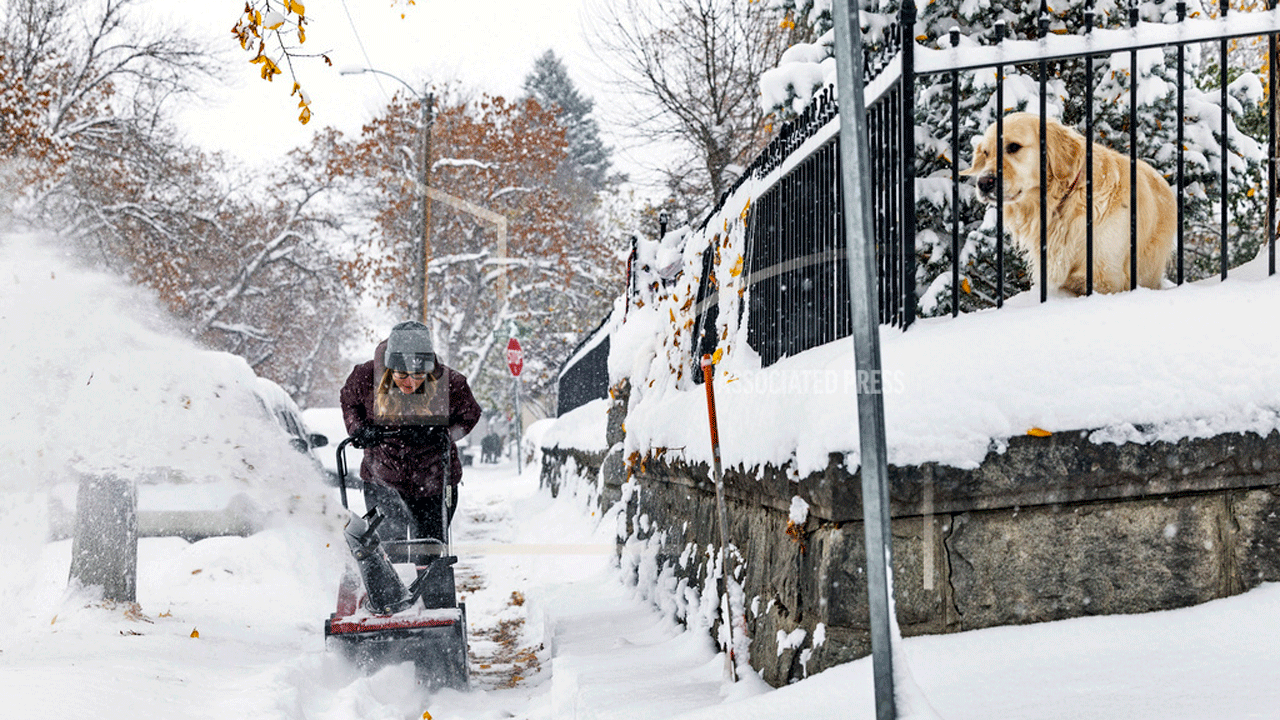 Snow piles up in North Dakota as region's first major snowstorm of the season moves eastward