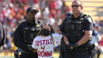 California-USC game delayed after students protest professor's stalking suspension