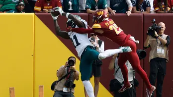 AJ Brown sets NFL record as Eagles use second-half surge to beat Commanders