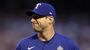 Rangers' Max Scherzer exits World Series Game 3 start with apparent back injury