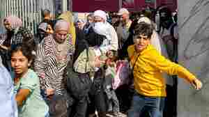 Photos: A look at the scene of the Rafah border crossing opening