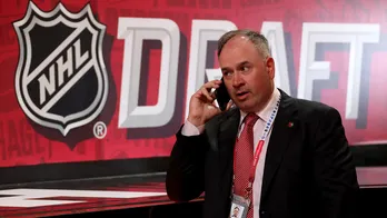 Senators general manager Pierre Dorion resigns after botched trade leads NHL to dock first-round draft pick