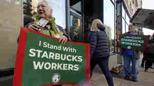 Thousands of Starbucks workers go on a one-day strike on one of chain's busiest days