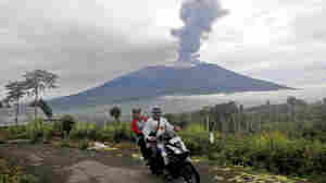 11 bodies recovered after Indonesia volcanic eruption as 12 climbers remain missing