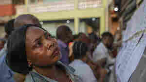 Voting for president in Congo begins as fears persist over safety, credible election