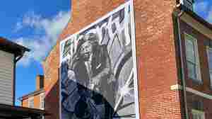 A Frederick Douglass mural in his hometown in Maryland draws some divisions