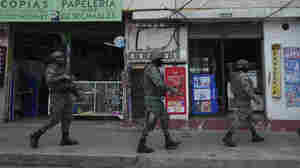 Armed men break into a live TV studio in Ecuador as the country is rocked by attacks