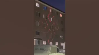 Swastika projected on University of Wisconsin-Whitewater dorm by group 'chanting racist words'