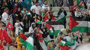 Palestinians find a bit of hope as their national soccer team advances in Asian Cup