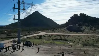 Migrants caught on new video streaming down remote California mountainside to illegally cross the border