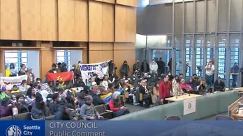 Seattle City Council meeting disrupted by protesters banging on windows, 6 arrested