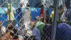 Haiti declares a curfew as it tries to restore order after weekend jailbreak