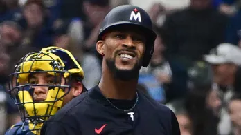 Twins' Byron Buxton nearly collides with bratwurst mascot during game vs Brewers