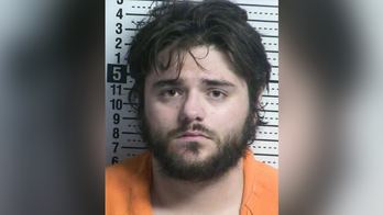 Naked New Mexico man arrested after allegedly ripping light fixture off home's front porch, assaulting officer