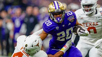 Washington Huskies running back charged with raping 2 women