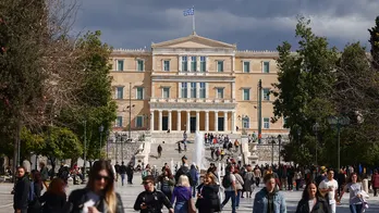 Greek lawmaker will face criminal charges after physical altercation with a colleague in Parliament