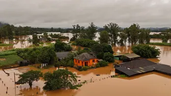 Death toll from heavy rains, flooding rises to 13 in southern Brazil