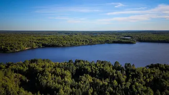 Minnesota man, 62, on solo camping trip found dead in lake near overturned canoe