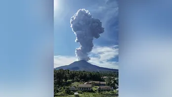 Images show spectacle of Indonesian volcano eruption as authorities evacuate 7 nearby villages