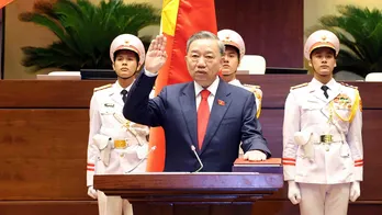 Top Vietnamese security official sworn in as president, worrying human rights groups