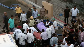 Police say at least 27 people killed in a fire at western India amusement park